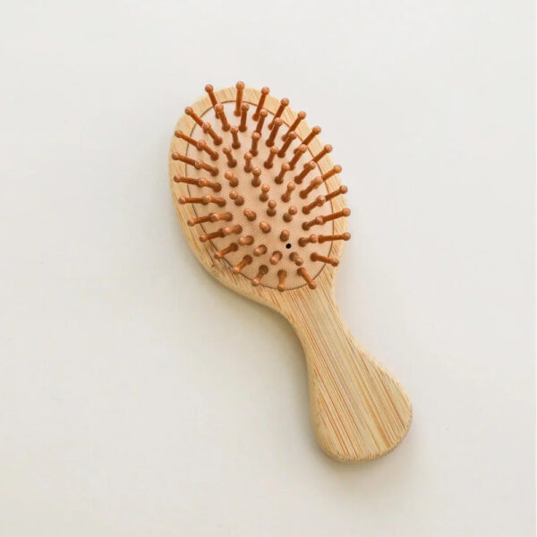 Natural wood hairbrush