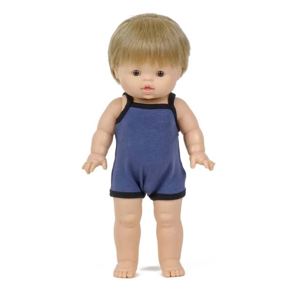 Dressed Minikane doll standing