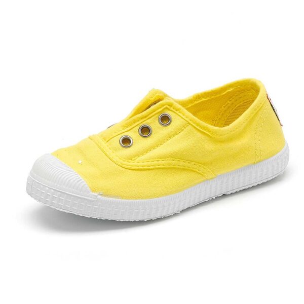 Yellow canvas tennis