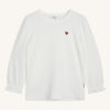 T-shirt blanc avec petit coeur rouge