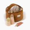 Tan nursery basket and 4 accessories
