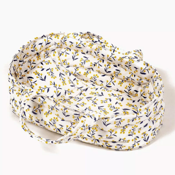 Cotton bassinet and Mimosa pillow