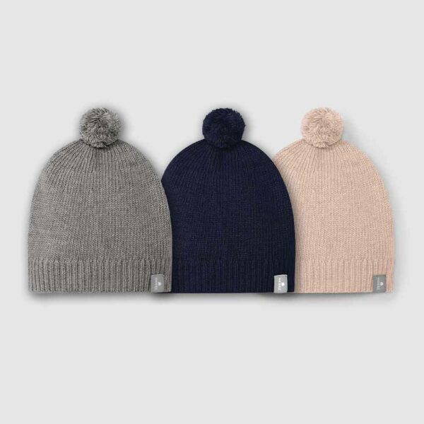 Bonnet bébé uni à pompon