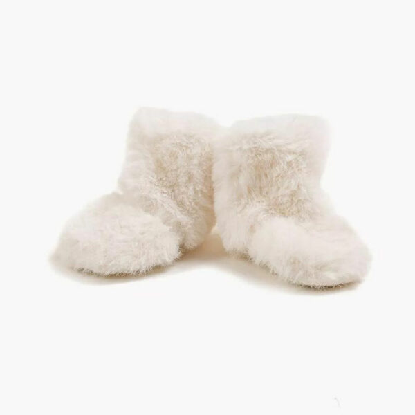 Boots en fausse fourrure écru