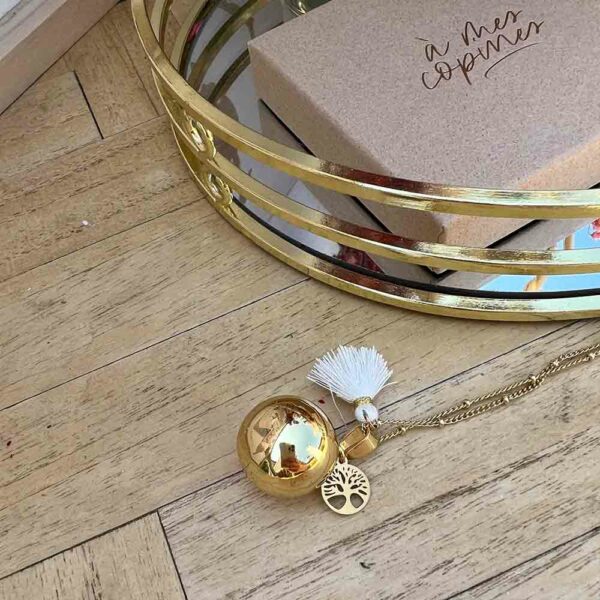 Bola de grossesse or avec pompon blanc